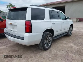 2020 Chevrolet Tahoe LT with VIN 1GNSKBKC8LR108377, listed as a IAAI auction lot 42545775 with 90,425 mi miles and . Bid and sale history available at DreamBid. Image 4.