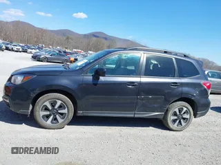 2018 Subaru Forester Premium with VIN JF2SJAGC4JH615487, listed as a IAAI auction lot 41854410 with 320,094 mi miles. Bid and sale history available at carsss.com. Image 15.