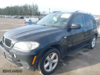 2011 BMW X5 35i with VIN 5UXZV4C57BL408907, listed as a IAAI auction lot 41807017 with 162,710 mi miles. Bid and sale history available at carsss.com. Image 2.