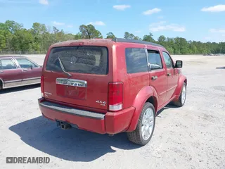 2007 Dodge Nitro R/T with VIN 1D8GU58667W669410, listed as a IAAI auction lot 42077739 with 107,613 mi miles. Bid and sale history available at carsss.com. Image 4.