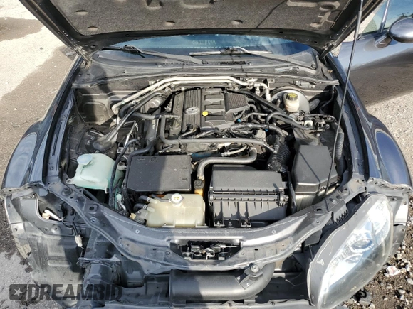 2015 Mazda MX-5 Miata Grand Touring z VIN JM1NC2PF3F0239991, wystawiony jako Copart lot #46989165 z przebiegiem 139 801 mil mil oraz Szkoda całkowita • Salvage title. Historia ofert i sprzedaży dostępna na DreamBid. Obrazek 11.