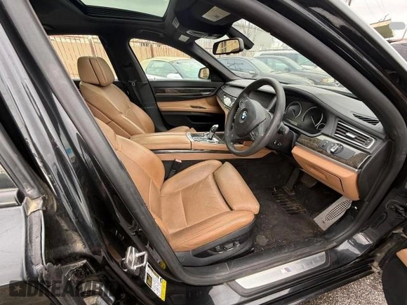 2012 BMW 7 Series 750i с VIN WBAKA8C5XCDX01120, выставлен на аукционе Copart как лот 47065425 с пробегом 71 313 миль миль и Списание • Salvage title. История ставок и продаж доступна на DreamBid. Изображение 5.