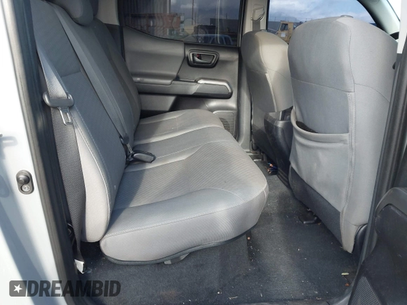 2020 Toyota Tacoma SR5 with VIN 3TMCZ5AN7LM366243, listed as a IAAI auction lot 41399117 with 58,126 mi miles and . Bid and sale history available at DreamBid. Image 8.