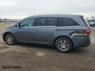 2012 Honda Odyssey EX-L with VIN 5FNRL5H61CB508181, listed as a Copart auction lot 52174205 with 203,763 mi miles and Salvage Title. Bid and sale history available at carsss.com. Image 2.