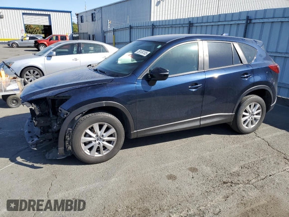 2015 Mazda CX-5 Sport with VIN JM3KE2BEXF0483141, listed as a Copart auction lot 59134105 with 71,727 mi miles and Salvage title. Bid and sale history available at DreamBid. Image 1.
