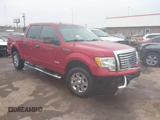 2011 Ford F-150 XLT with VIN 1FTFW1CT0BKE22149, listed as a IAAI auction lot 41548059 with 173,160 mi miles. Bid and sale history available at carsss.com. Image 1.