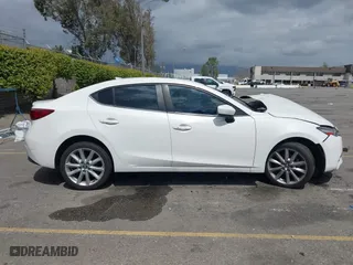 2017 Mazda Mazda3 4-Door Touring with VIN 3MZBN1V76HM121935, listed as a IAAI auction lot 41831505 with 121,631 mi miles. Bid and sale history available at carsss.com. Image 13.