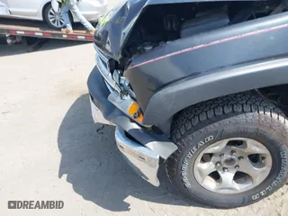 2003 Chevrolet Tahoe Z71 with VIN 1GNEK13Z13R166468, listed as a IAAI auction lot 41848131 with 163,738 mi miles. Bid and sale history available at carsss.com. Image 6.