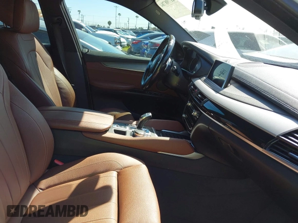 2018 BMW X6 xDrive35i with VIN 5UXKU2C5XJ0X50408, listed as a IAAI auction lot 41798784 with 69,134 mi miles. Bid and sale history available at carsss.com. Image 5.