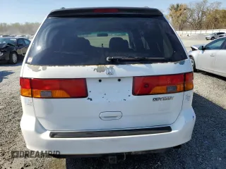 2000 Honda Odyssey EX with VIN 2HKRL1861YH564896, listed as a Copart auction lot 50635805 with 156,313 mi miles and Salvage Title. Bid and sale history available at DreamBid. Image 6.