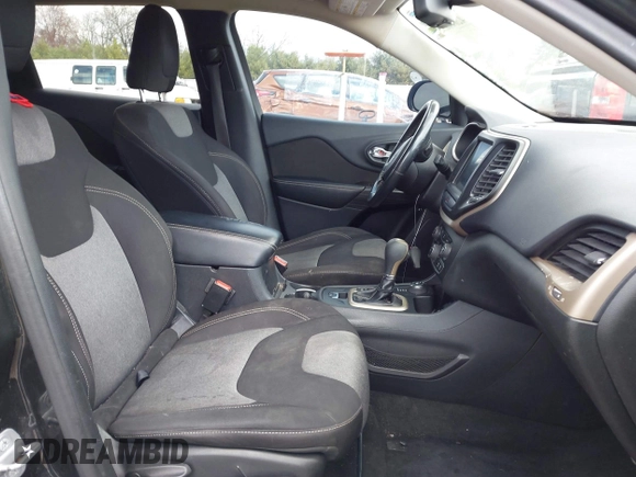 2014 Jeep Cherokee Latitude with VIN 1C4PJMCS6EW219999, listed as a IAAI auction lot 42044695 with 169,533 mi miles and . Bid and sale history available at carsss.com. Image 5.