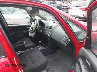 2011 Suzuki SX4 Crossover with VIN JS2YB5A39B6301570, listed as a IAAI auction lot 41666875 with 103,724 mi miles. Bid and sale history available at carsss.com. Image 5.