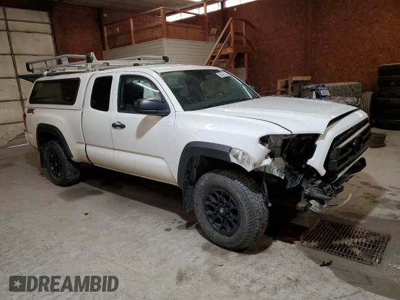 2020 Toyota Tacoma SR with VIN 3TYSX5EN1LT002710, listed as a Copart auction lot 59847435 with 82,341 mi miles and Salvage title. Bid and sale history available at DreamBid. Image 4.