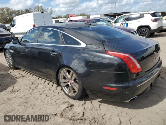 2015 Jaguar XJ with VIN SAJWA2GZ6F8V81068, listed as a Copart auction lot 78954824 with 79,565 mi miles and Clean Title. Bid and sale history available at carsss.com. Image 2.