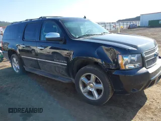 2012 Chevrolet Suburban LTZ with VIN 1GNSKKE74CR324578, listed as a IAAI auction lot 42129334 with 182,655 mi miles. Bid and sale history available at carsss.com. Image 1.