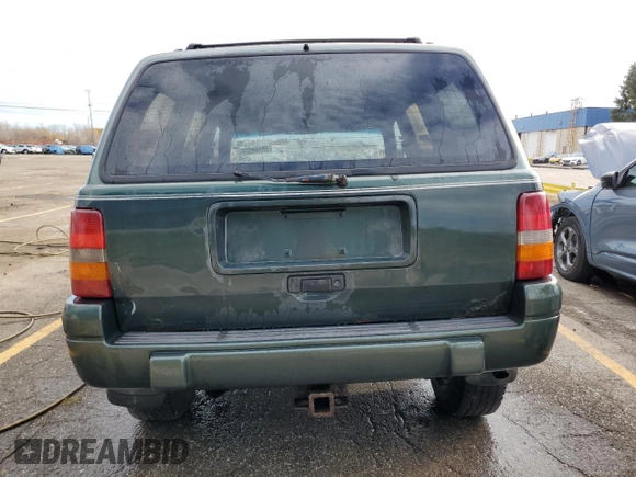 1996 Jeep Grand Cherokee Laredo with VIN 1J4GZ58S4TC281689, listed as a Copart auction lot 78466524 with 0 mi miles and Salvage Title. Bid and sale history available at carsss.com. Image 6.