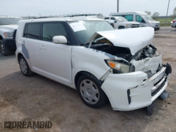 2012 Scion xB with VIN JTLZE4FE4CJ004977, listed as a IAAI auction lot 42116864 with 119,206 mi miles. Bid and sale history available at carsss.com. Image 1.