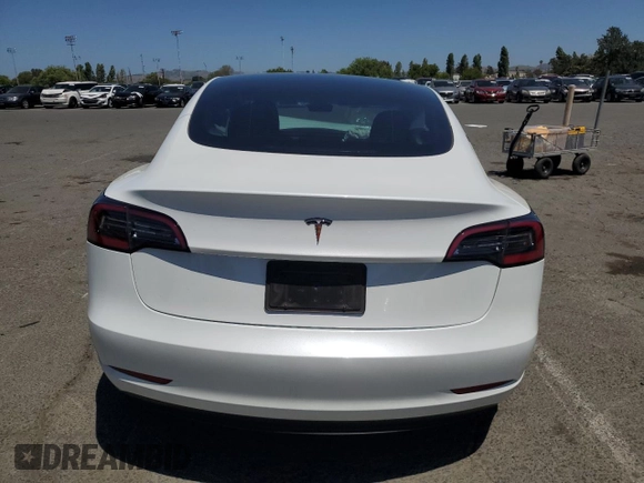2023 Tesla Model 3 с VIN 5YJ3E1EA3PF575985, выставлен на аукционе Copart как лот 56001075 с пробегом 54 640 миль миль и Списание • Salvage title. История ставок и продаж доступна на DreamBid. Изображение 6.