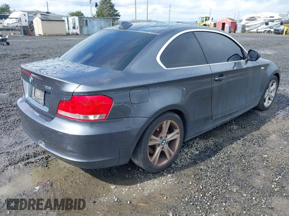 2013 BMW 1 Series 128i with VIN WBAUP7C5XDVP24796, listed as a IAAI auction lot 41807533 with 157,614 mi miles and . Bid and sale history available at carsss.com. Image 4.