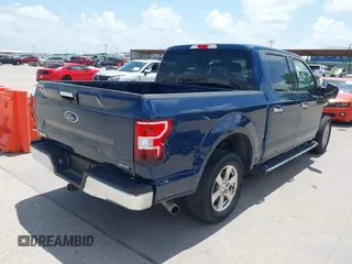 2019 Ford F-150 XL with VIN 1FTEW1C47KKE35050, listed as a IAAI auction lot 42684676 with 123,217 mi miles and . Bid and sale history available at DreamBid. Image 4.