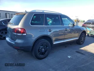 2010 Volkswagen Touareg VR6 with VIN WVGBF7A98AD001335, listed as a Copart auction lot 81735614 with 160,478 mi miles and Salvage Title. Bid and sale history available at DreamBid. Image 3.