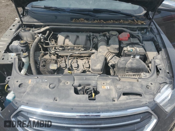 2013 Ford Taurus Limited with VIN 1FAHP2J87DG181051, listed as a Copart auction lot 70630404 with 157,323 mi miles and Salvage title. Bid and sale history available at DreamBid. Image 11.