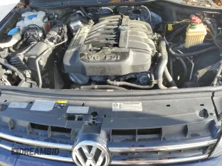 2014 Volkswagen Touareg Sport with VIN WVGEF9BP0ED005648, listed as a Copart auction lot 53230315 with 188,103 mi miles and Clean Title. Bid and sale history available at DreamBid. Image 12.