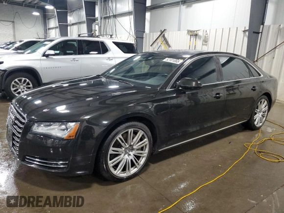 2011 Audi A8 z VIN WAURVAFD8BN005569, wystawiony jako Copart lot #52101065 z przebiegiem 104 893 mil mil oraz Szkody całkowita. Historia ofert i sprzedaży dostępna na DreamBid. Obrazek 1.