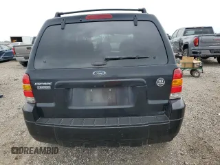 2005 Ford Escape Limited z VIN 1FMYU04135KB19386, wystawiony jako Copart lot #51686515 z przebiegiem Nie podano mil oraz Szkoda całkowita • Salvage title. Historia ofert i sprzedaży dostępna na DreamBid. Obrazek 6.