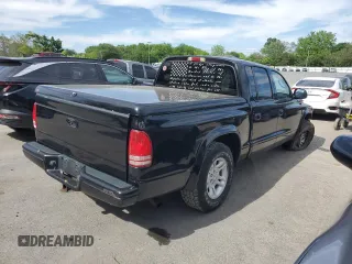 2002 Dodge Dakota Sport с VIN 1B7HL38X02S720595, выставлен на аукционе Copart как лот 57847915 с пробегом 200 618 миль миль и Списание • Salvage title. История ставок и продаж доступна на DreamBid. Изображение 3.