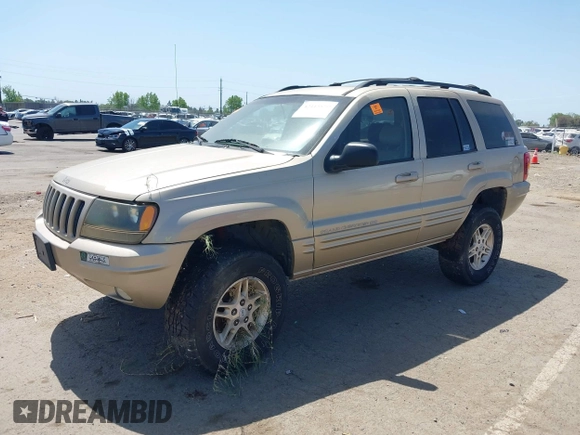 1999 Jeep Grand Cherokee Limited with VIN 1J4GW68N2XC654713, listed as a IAAI auction lot 42115829 with 195,988 mi miles. Bid and sale history available at carsss.com. Image 2.