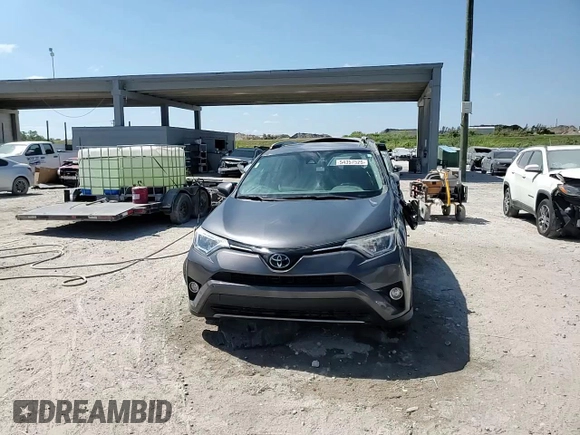 2018 Toyota RAV4 XLE with VIN 2T3WFREV1JW475641, listed as a Copart auction lot 54357525 with 53,609 mi miles and Salvage Title. Bid and sale history available at DreamBid. Image 14.