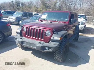 2022 Jeep Wrangler Unlimited High Tide with VIN 1C4HJXDG1NW119356, listed as a IAAI auction lot 41525063 with 18,025 mi miles and . Bid and sale history available at DreamBid. Image 2.