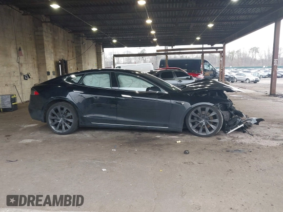 2021 Tesla Model S Long Range Plus with VIN 5YJSA1E28MF425446, listed as a IAAI auction lot 42026147 with 46,464 mi miles and . Bid and sale history available at DreamBid. Image 12.