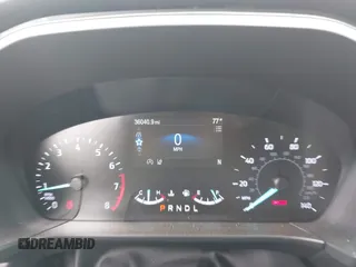 2021 Ford Escape SE z VIN 1FMCU9G6XMUA27362, wystawiony jako IAAI lot #42438771 z przebiegiem 36 040 mil mil oraz . Historia ofert i sprzedaży dostępna na DreamBid. Obrazek 7.