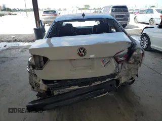 2015 Volkswagen Passat SE with VIN 1VWBS7A33FC026231, listed as a Copart auction lot 52021205 with 180,507 mi miles and Salvage title. Bid and sale history available at DreamBid. Image 6.
