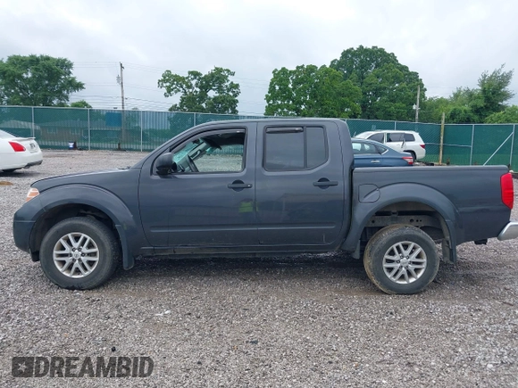 2015 Nissan Frontier SL with VIN 1N6AD0EV1FN764719, listed as a IAAI auction lot 42512771 with 104,572 mi miles and . Bid and sale history available at DreamBid. Image 15.