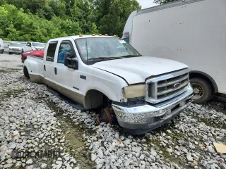 2001 Ford F-350 XL with VIN 1FTWW32F11EB16761, listed as a Copart auction lot 62511635 with 257,065 mi miles and Salvage title. Bid and sale history available at DreamBid. Image 4.