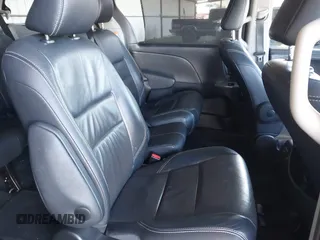 2015 Toyota Sienna SE with VIN 5TDXK3DC1FS667924, listed as a IAAI auction lot 42062805 with 123,504 mi miles. Bid and sale history available at carsss.com. Image 8.