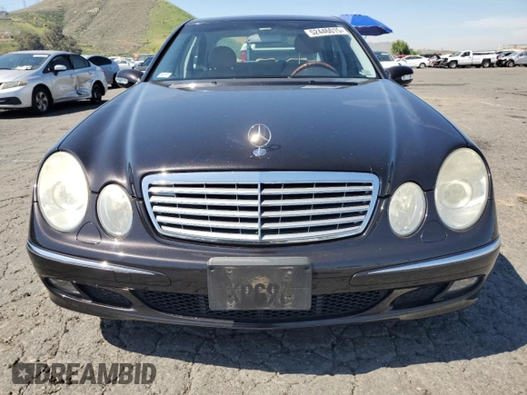 2005 Mercedes-Benz E 320 with VIN WDBUF65J55A675993, listed as a Copart auction lot 52446015 with 64,459 mi miles and Salvage Title. Bid and sale history available at DreamBid. Image 5.