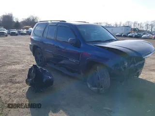 2002 GMC Envoy SLT with VIN 1GKDT13S922464265, listed as a IAAI auction lot 41703975 with 173,495 mi miles. Bid and sale history available at carsss.com. Image 1.