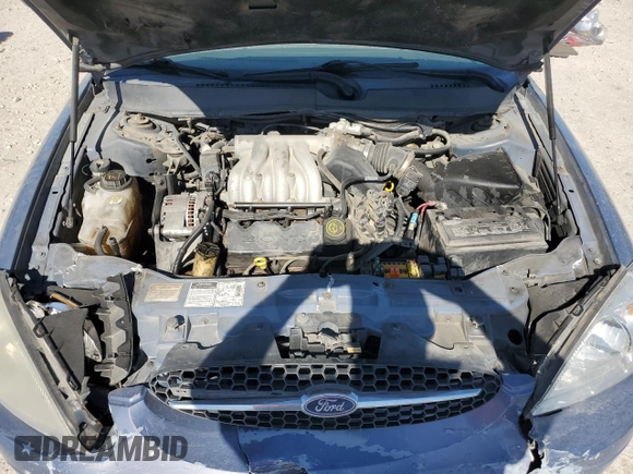 2000 Ford Taurus SE with VIN 1FAFP53U3YG259124, listed as a Copart auction lot 77363344 with 154,889 mi miles and Salvage Title. Bid and sale history available at DreamBid. Image 12.