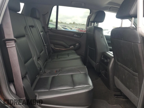 2017 Chevrolet Tahoe LT z VIN 1GNSKBKCXHR140366, wystawiony jako Copart lot #56527295 z przebiegiem Nie podano mil oraz Szkoda całkowita • Salvage title. Historia ofert i sprzedaży dostępna na DreamBid. Obrazek 11.