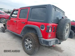 2021 Jeep Wrangler Unlimited Rubicon with VIN 1C4JJXFM1MW830218, listed as a IAAI auction lot 39934037 with Not provided miles and . Bid and sale history available at DreamBid. Image 3.