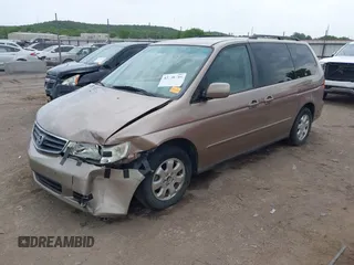 2003 Honda Odyssey EX-L z VIN 5FNRL18063B135949, wystawiony jako IAAI lot #42248105 z przebiegiem 210 567 mil mil oraz . Historia ofert i sprzedaży dostępna na DreamBid. Obrazek 2.