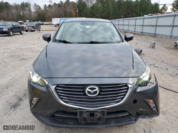 2016 Mazda CX-3 Grand Touring with VIN JM1DKBD72G0103803, listed as a Copart auction lot 82769204 with 91,727 mi miles and Salvage Title. Bid and sale history available at carsss.com. Image 5.