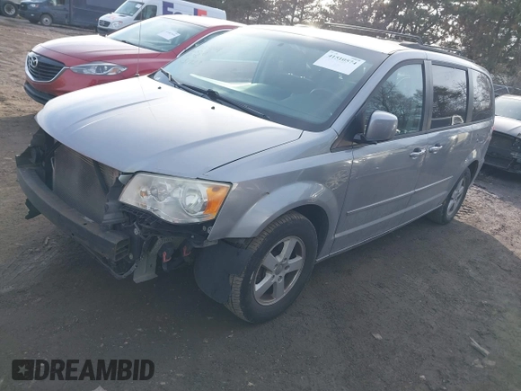 2013 Dodge Grand Caravan SXT with VIN 2C4RDGCG8DR551723, listed as a IAAI auction lot 41510574 with 183,432 mi miles and . Bid and sale history available at DreamBid. Image 2.