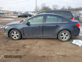 2014 Chevrolet Cruze 1LT with VIN 1G1PC5SB5E7229007, listed as a IAAI auction lot 41544780 with 98,075 mi miles and . Bid and sale history available at DreamBid. Image 14.