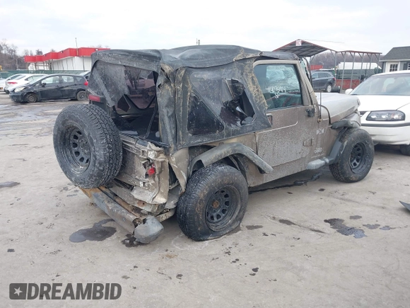 2003 Jeep Wrangler X with VIN 1J4FA39SX3P329386, listed as a IAAI auction lot 41407594 with 140,390 mi miles. Bid and sale history available at carsss.com. Image 4.