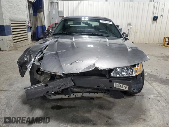 2003 Ford Mustang Deluxe z VIN 1FAFP44433F369534, wystawiony jako Copart lot #76606794 z przebiegiem 88 503 mil mil oraz Szkoda całkowita • Salvage title. Historia ofert i sprzedaży dostępna na DreamBid. Obrazek 5.
